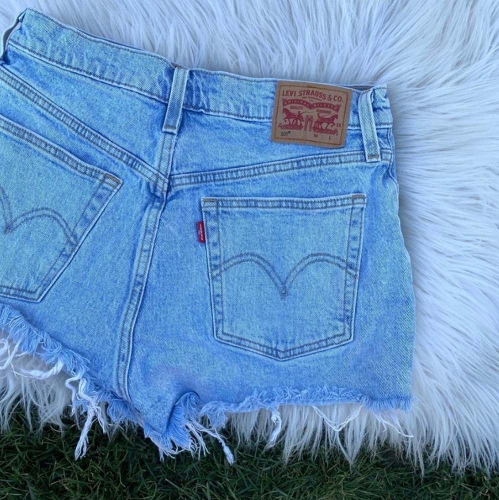 Levi's 501 high rise raw hem button fly